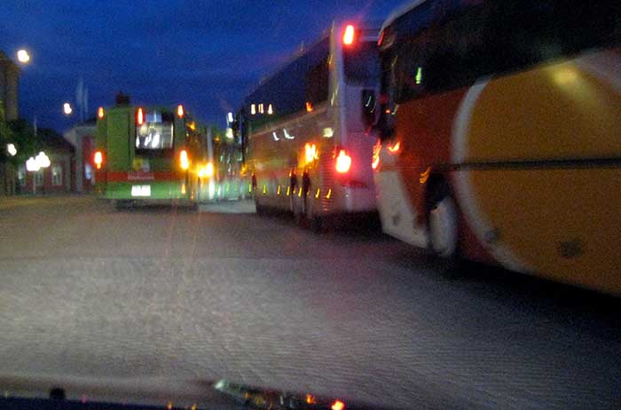 Bus stop at night.